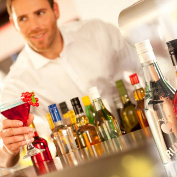 Man serving cocktail