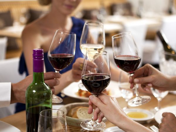 Cheers with Wine Glasses